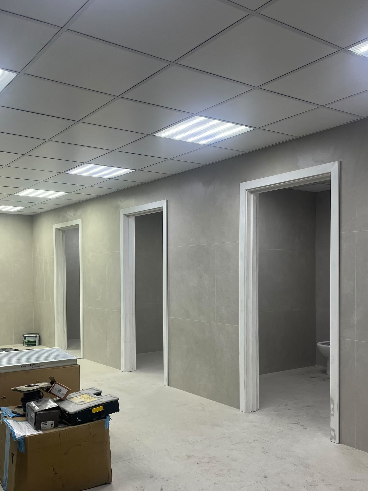 Changing rooms and washrooms being tiled out